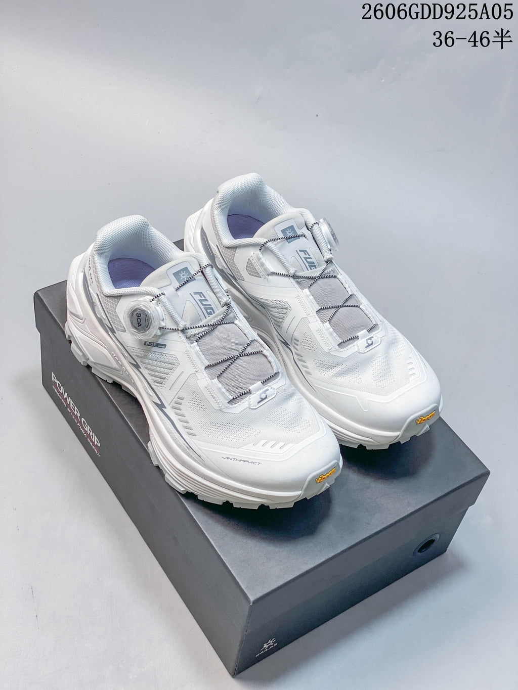 Pair of white and gray KAILAS FUGA EX3 shoes with dial closures, shown on a shoebox.