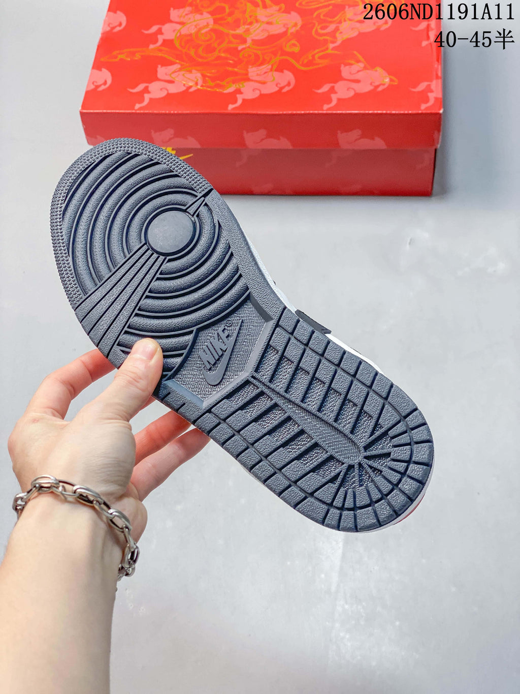 Close-up of the dark gray patterned outsole