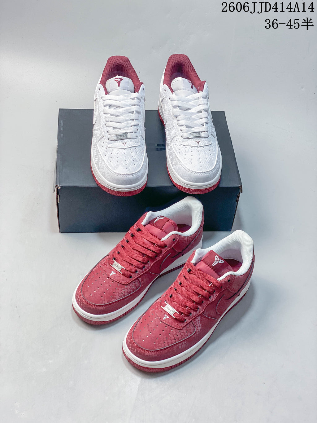 White and red low-top sneakers shown together from above