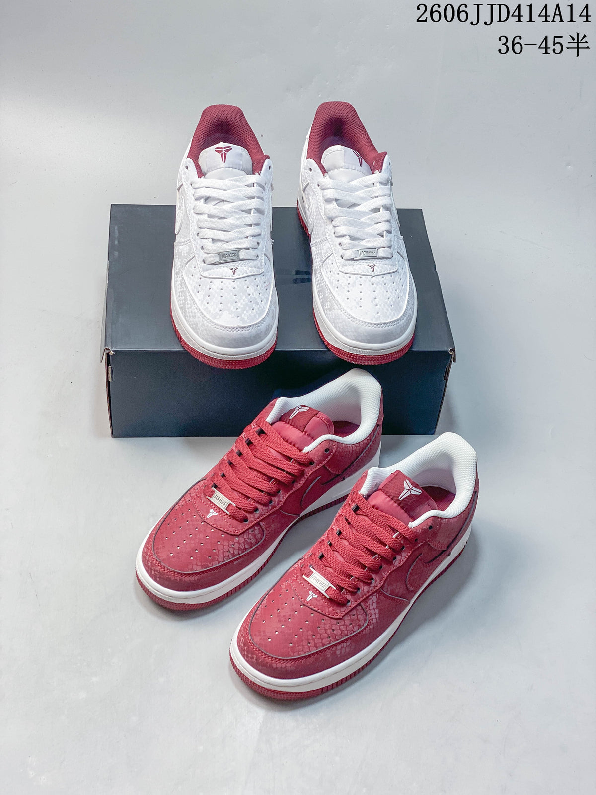 White and red low-top sneakers shown together from above