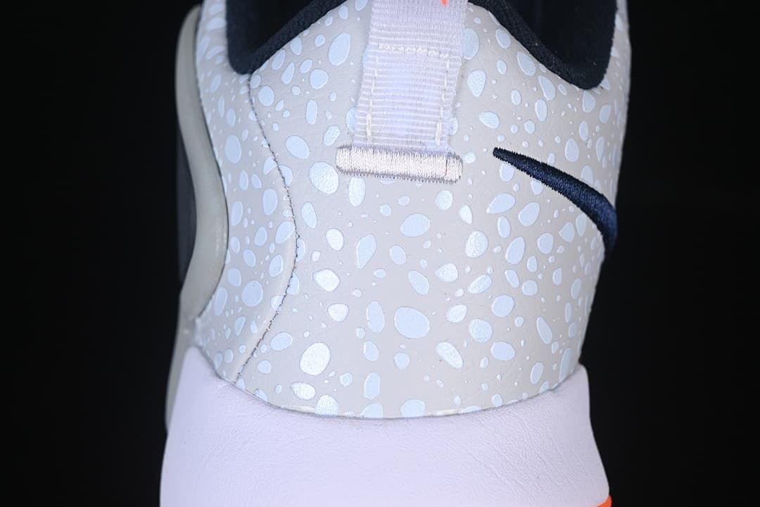 Close-up of the patterned heel panel and pull loop