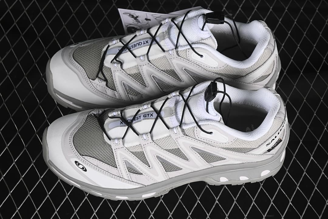 Pair of gray and white XT-Quest GTX sneakers viewed from above