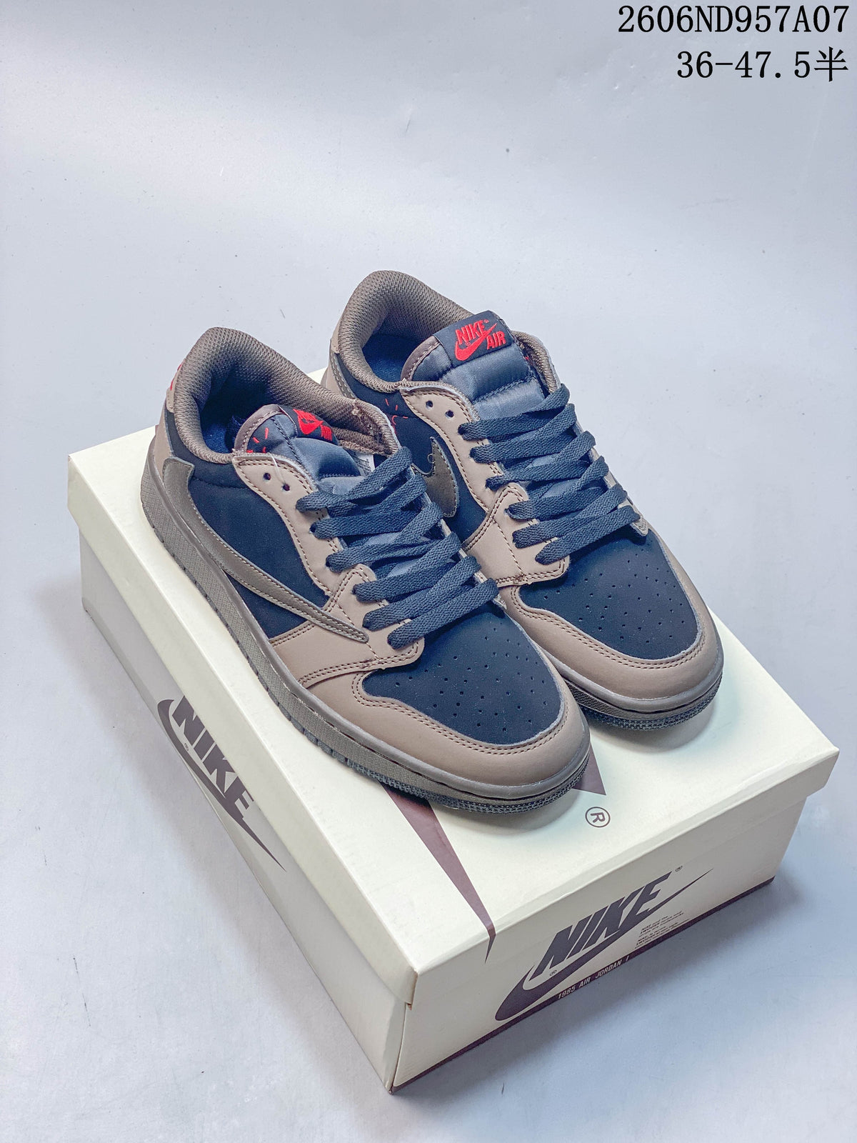 Pair of dark navy and brown low-top sneakers shown on a shoe box