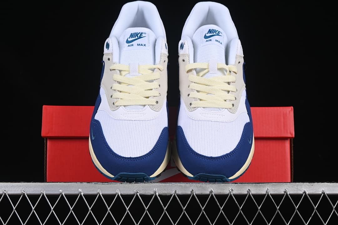 Front view of the pair showing mesh toes and navy overlays