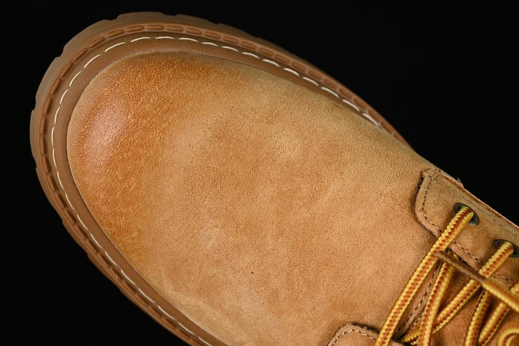 Close-up of the rounded toe and stitched welt