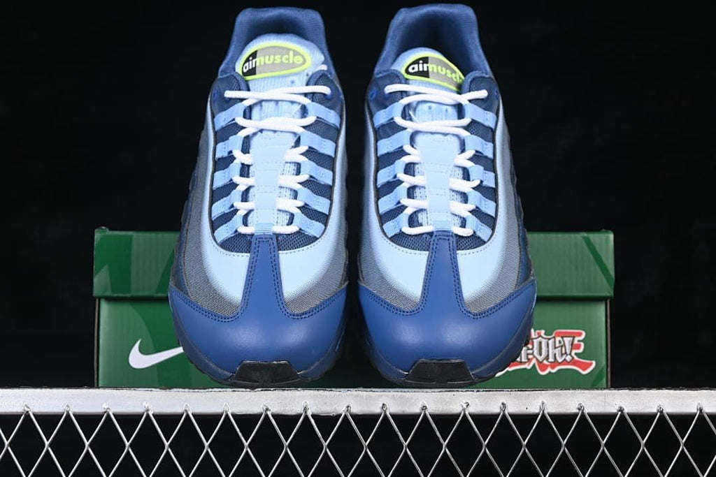 Front view of the pair showing blue panels and white laces