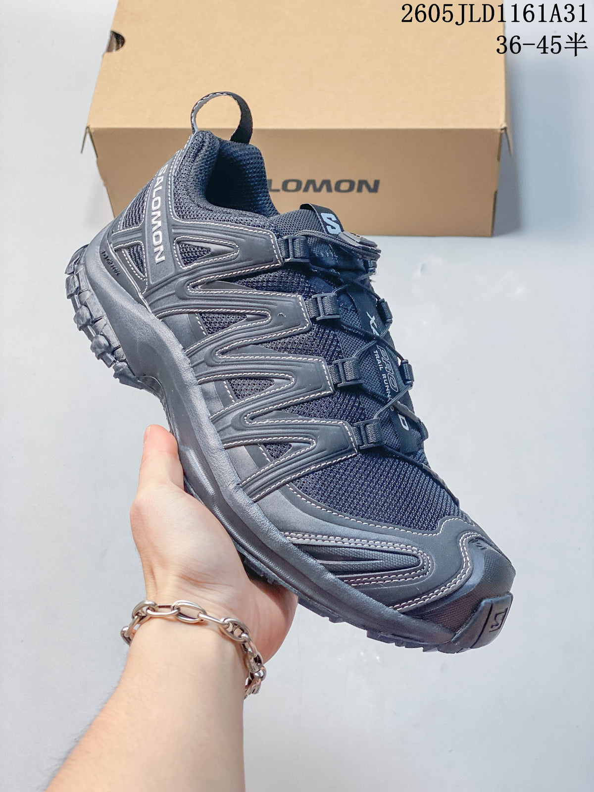 Side view of a dark gray Salomon XA Pro 3D sneaker with quick-lace closure.