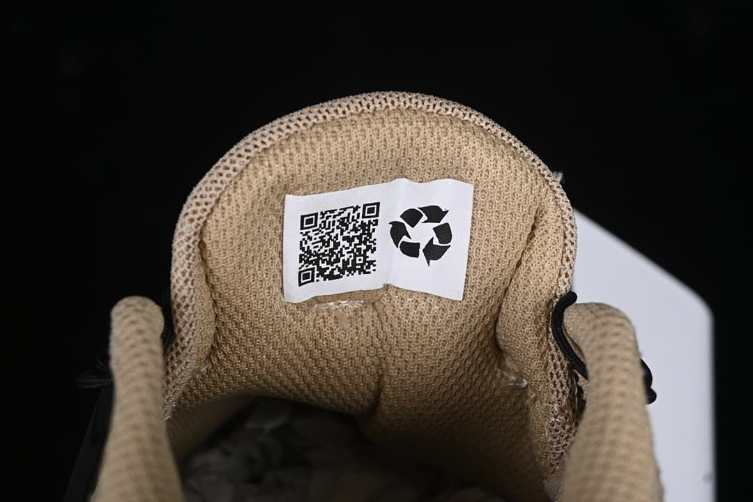 Close-up of the padded mesh tongue and interior label