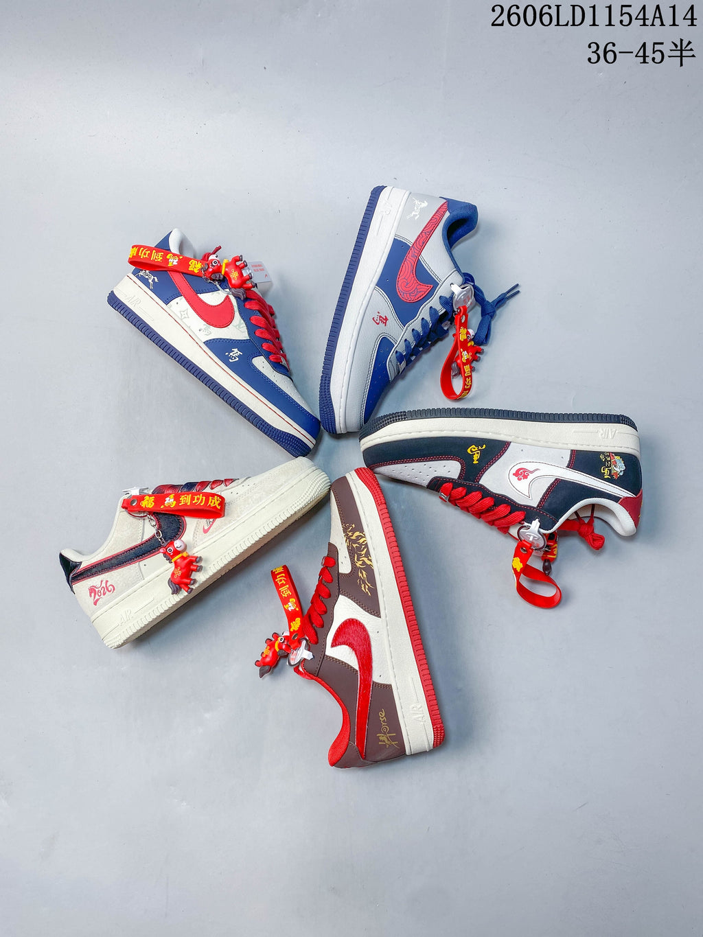 Several low-top sneakers arranged together, showing different colorways and decorative accessories