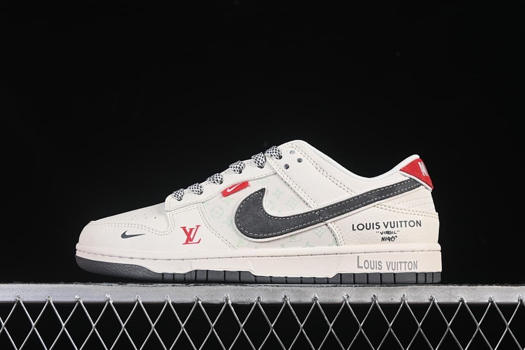 Side view of a cream Nike SB Dunk Low with a dark gray Swoosh, red accents, and Louis Vuitton and NIGO branding details.