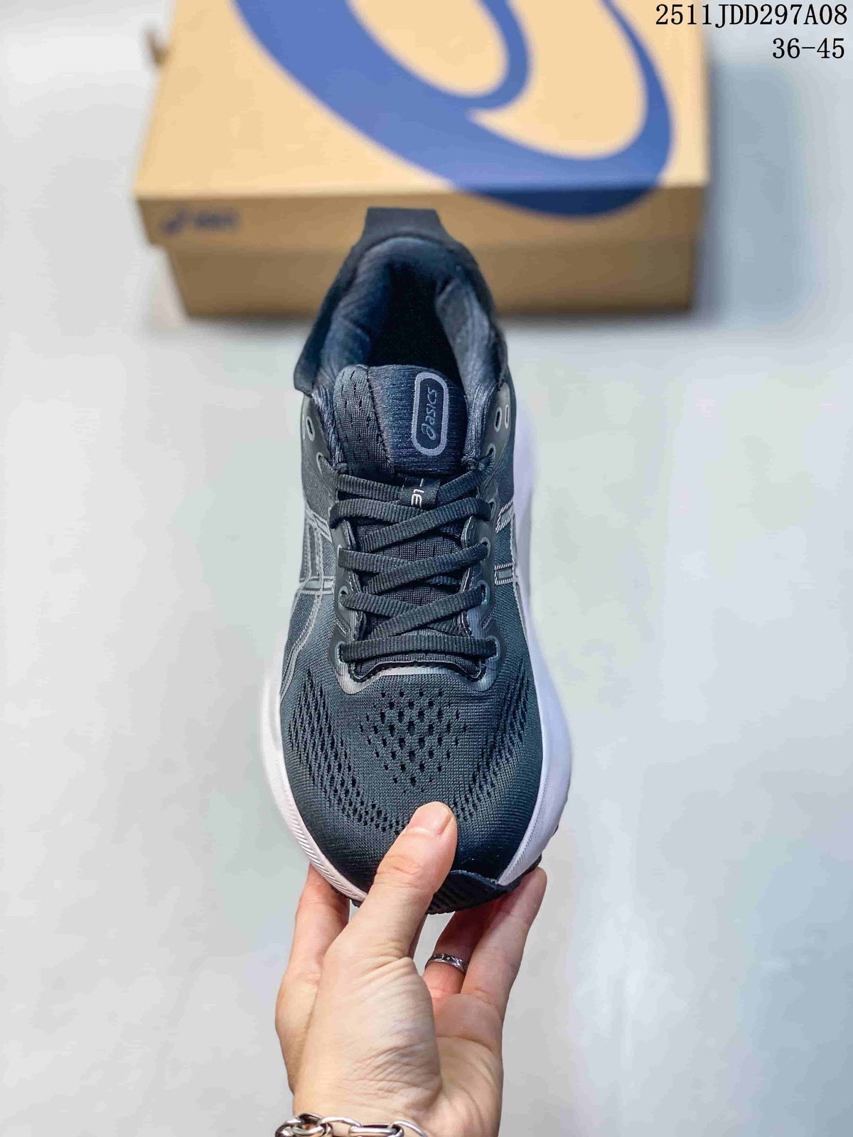 Front view of the lace-up shoe showing its dark upper and patterned toe area.