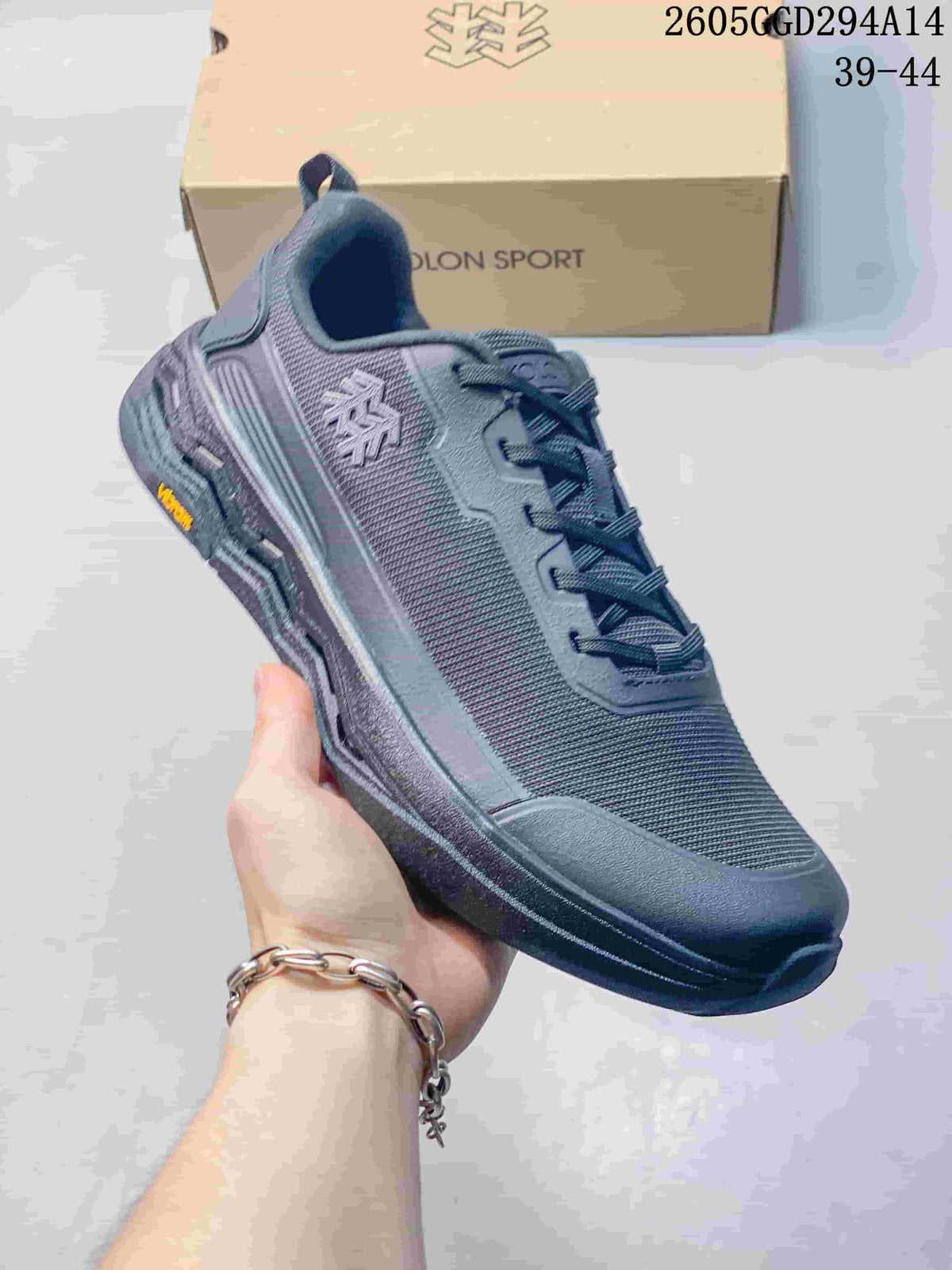 Angled view of the Kolon Sport sneaker showing its side logo and outsole