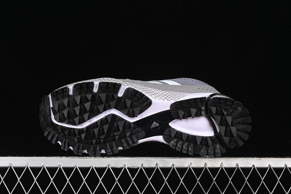 Underside view showing the black tread pattern