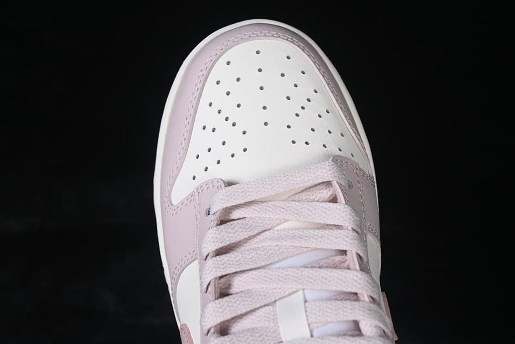 Top view of the perforated white toe and lacing