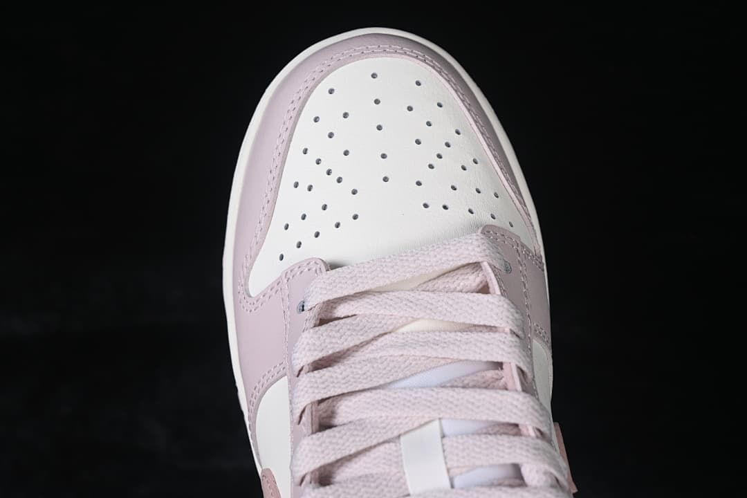 Top view of the perforated white toe and lacing