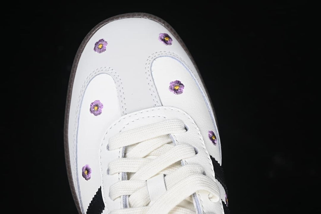 Top view of the toe area with purple embroidered flower details