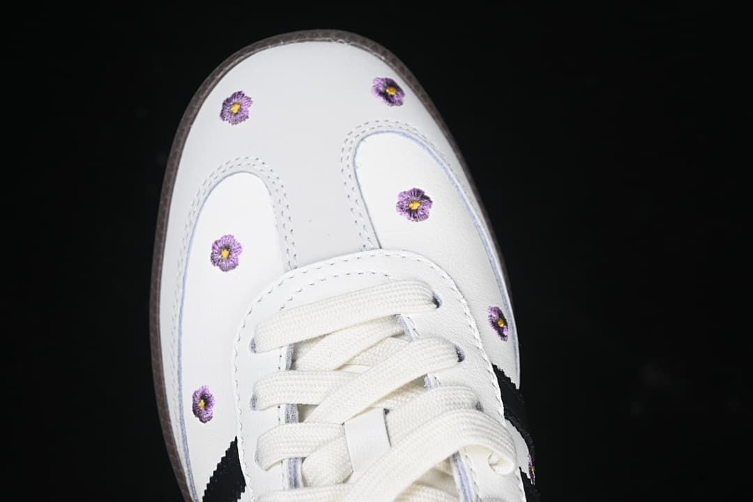 Top view of the toe area with purple embroidered flower details