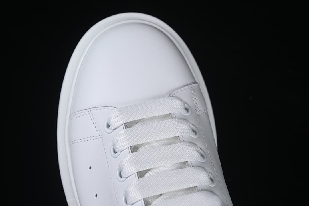 Close-up of the rounded toe and white laces