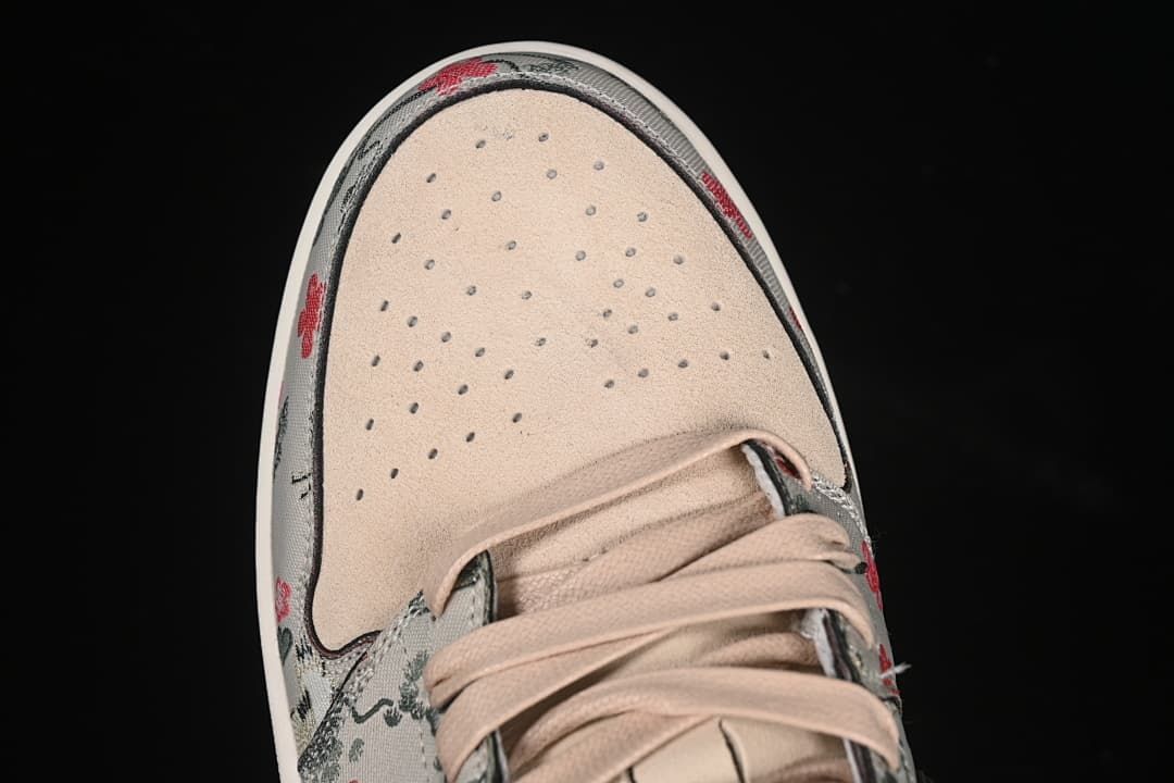 Top view of the perforated pale pink toe box