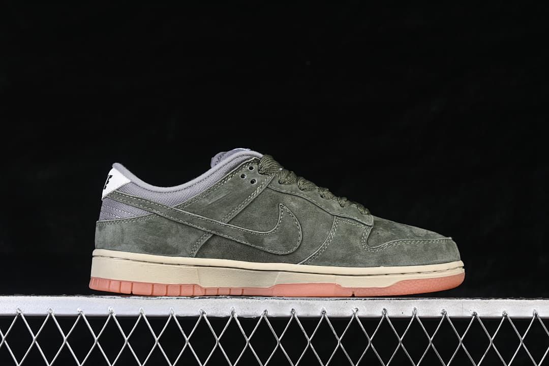 Side profile of the low-top sneaker with olive-green upper and contrasting sole