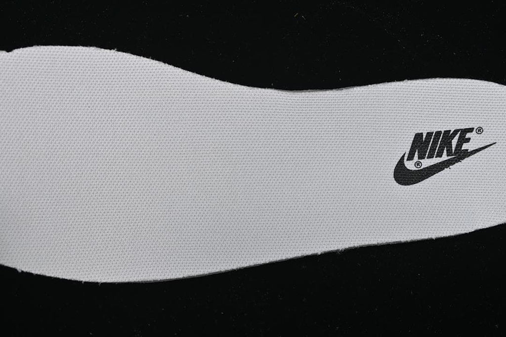 Close-up of a white shoe insole with Nike logo