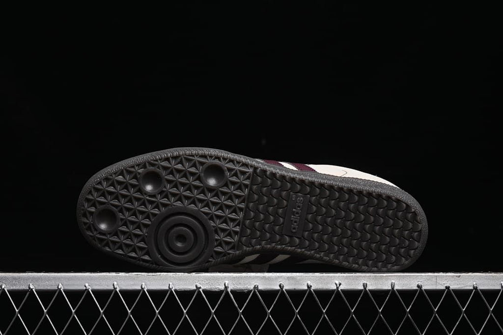 Underside showing the patterned dark rubber outsole.