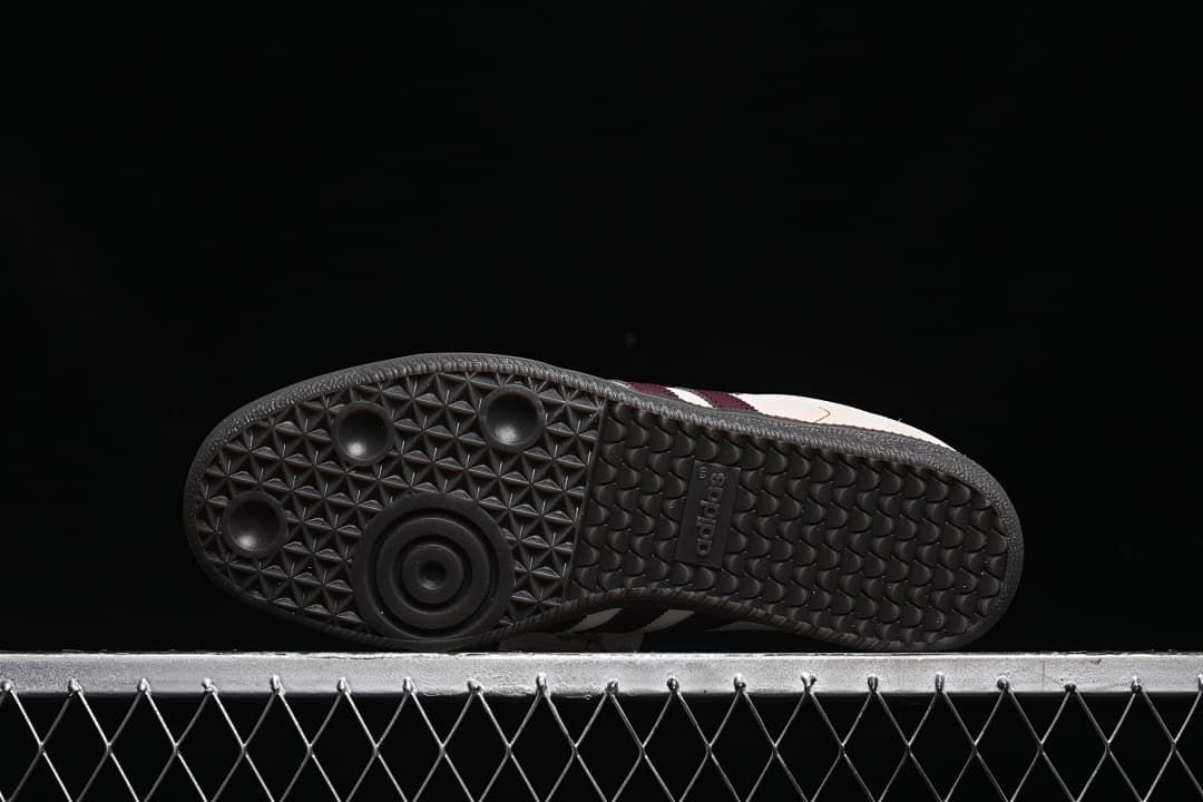 Underside showing the patterned dark rubber outsole.
