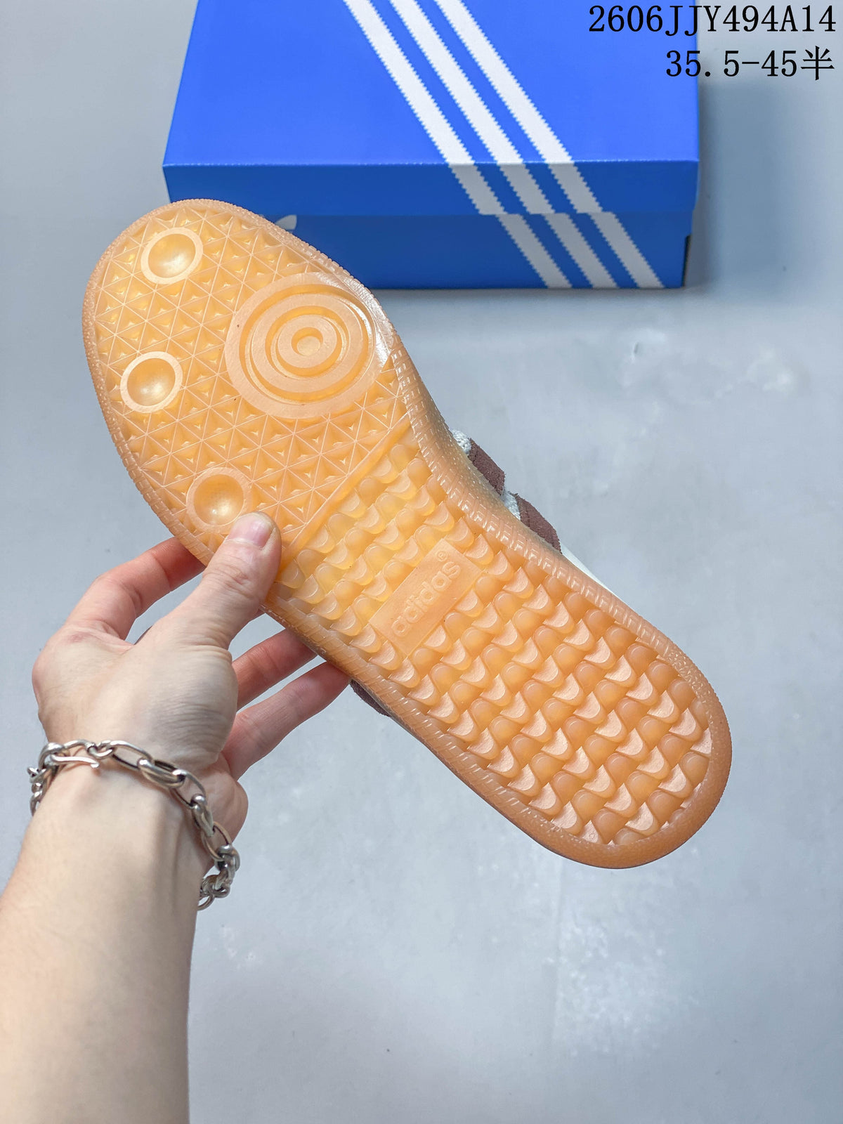 Underside view showing the gum-colored sole of the Samba-style mule.