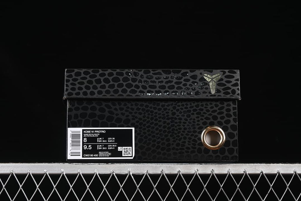 Black patterned shoe box with a visible Kobe VI Protro label and size markings