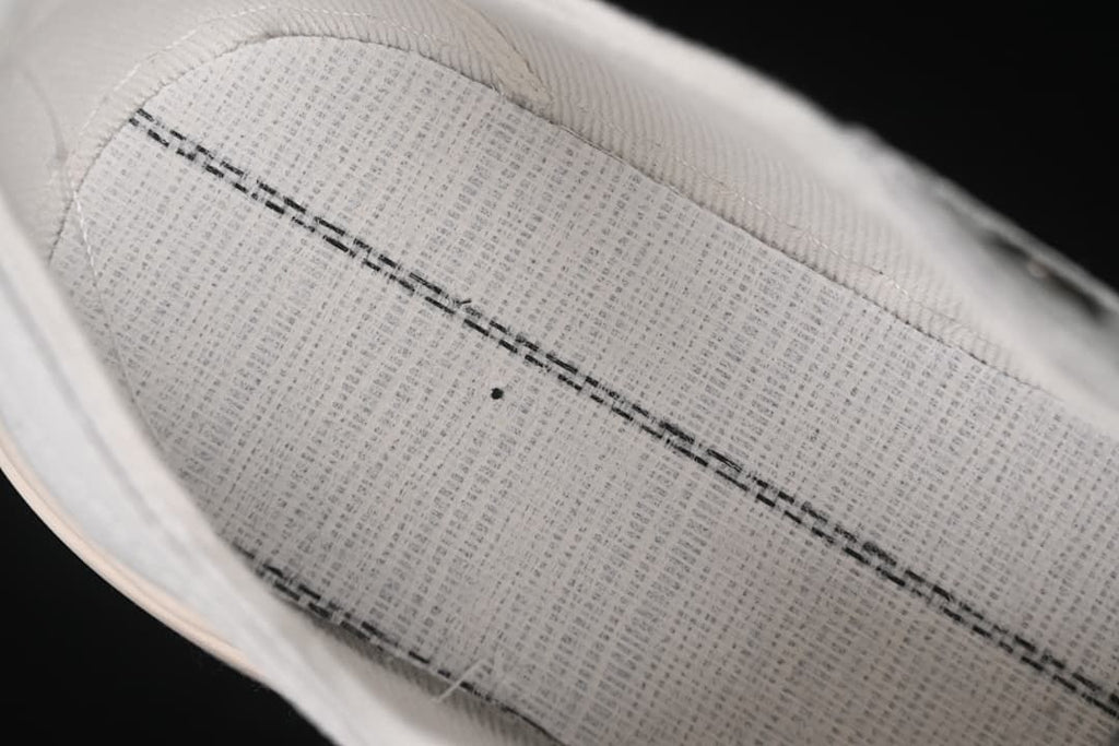 Close-up view inside the sneaker showing the footbed and stitching.