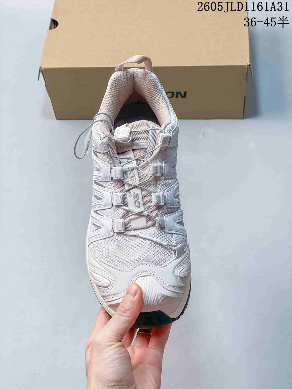 Top view showing the mesh upper and quick-lace closure on a Salomon XA Pro 3D sneaker