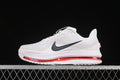Side view of a white Nike Air Zoom Pegasus Premium shoe with dark Swoosh and red midsole cushioning.