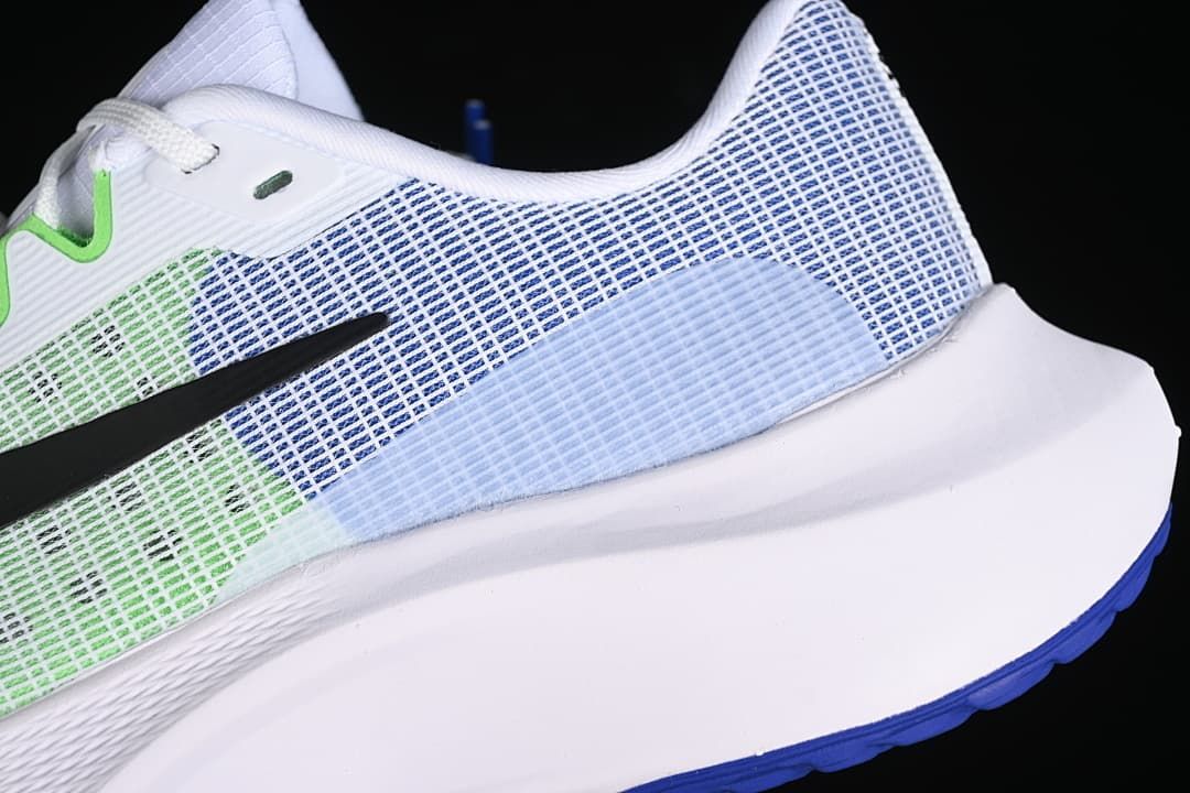 Close-up of the blue-and-white heel mesh and sculpted white midsole