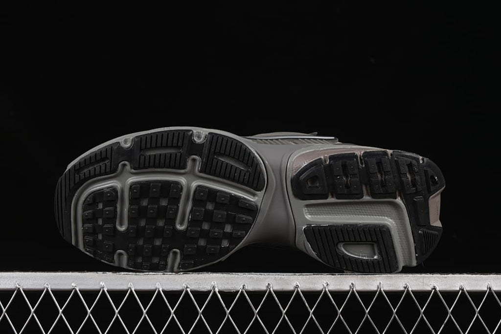 Underside view showing the patterned rubber outsoles