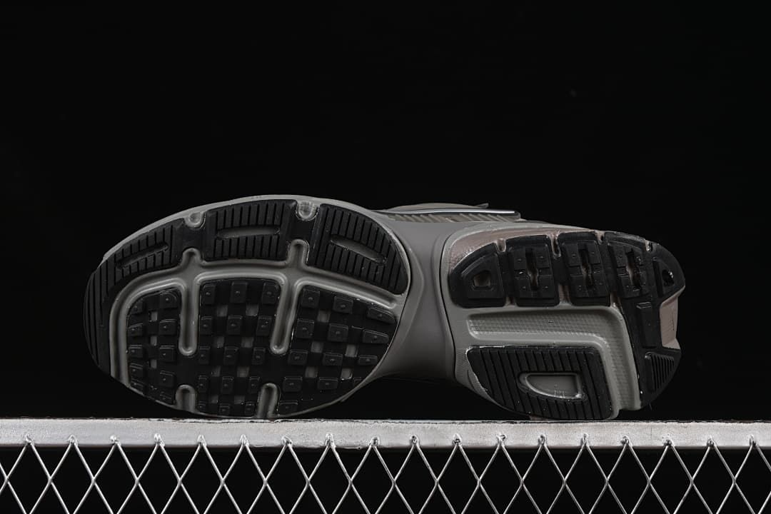 Underside view showing the patterned rubber outsoles