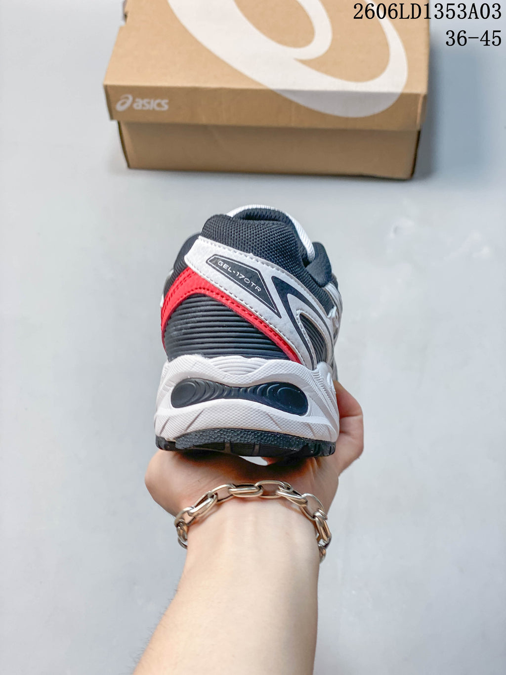 Rear view of the GEL-170TR showing a red heel accent and layered sole.