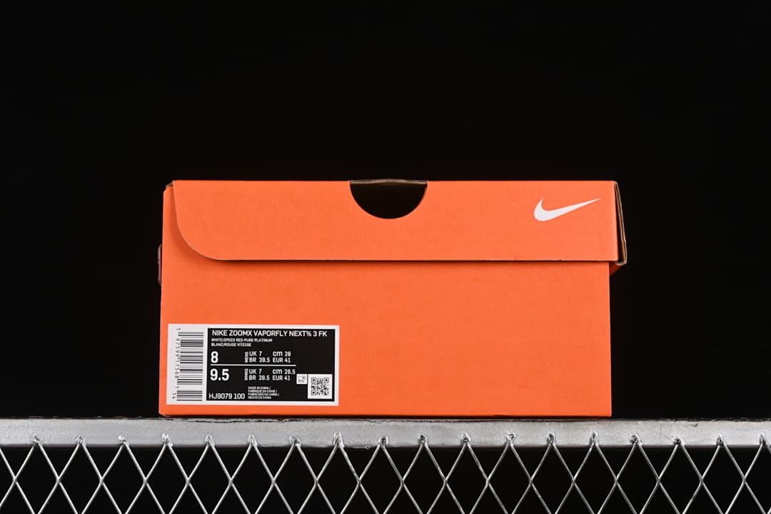 Orange shoe box with label identifying Nike ZoomX Vaporfly NEXT% 3 FK, style HJ9079-100