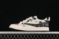 Side view of an off-white and black low-top sneaker with patterned panels, cream laces, and red accents.