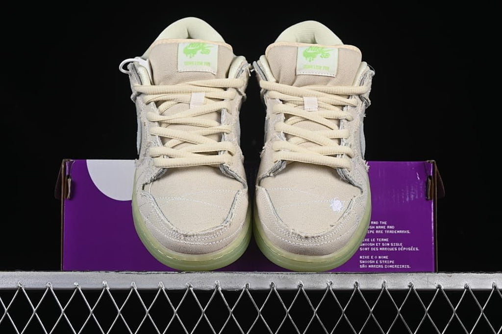 Front view of both shoes displayed against the shoe box