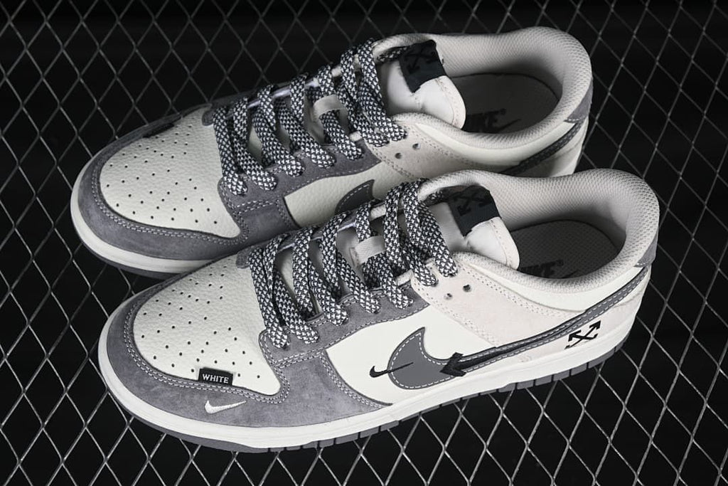 Top and side views of gray and white low-top sneakers showing perforated toe panels and patterned laces