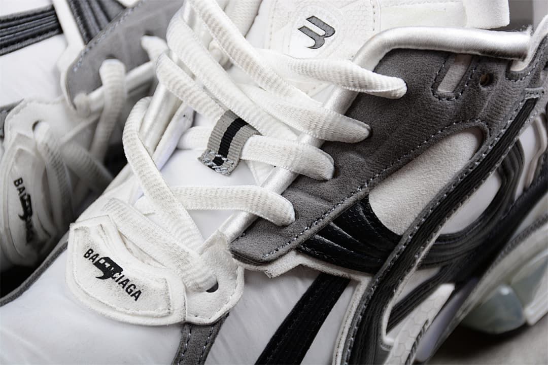 Detailed view of the laces and grey and black side panels