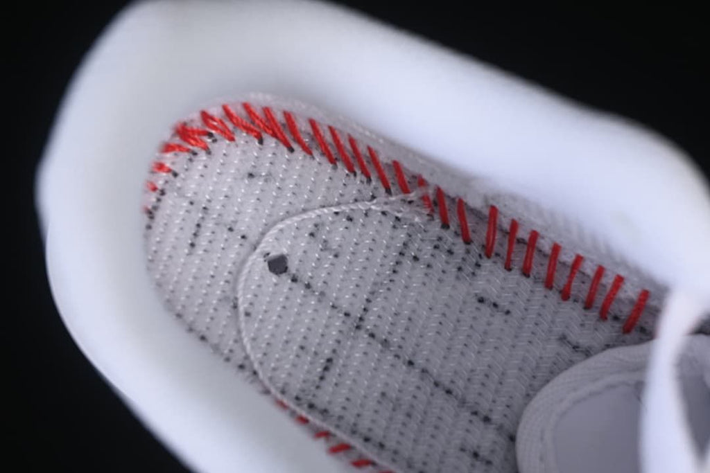 Close-up of the shoe interior and red stitching