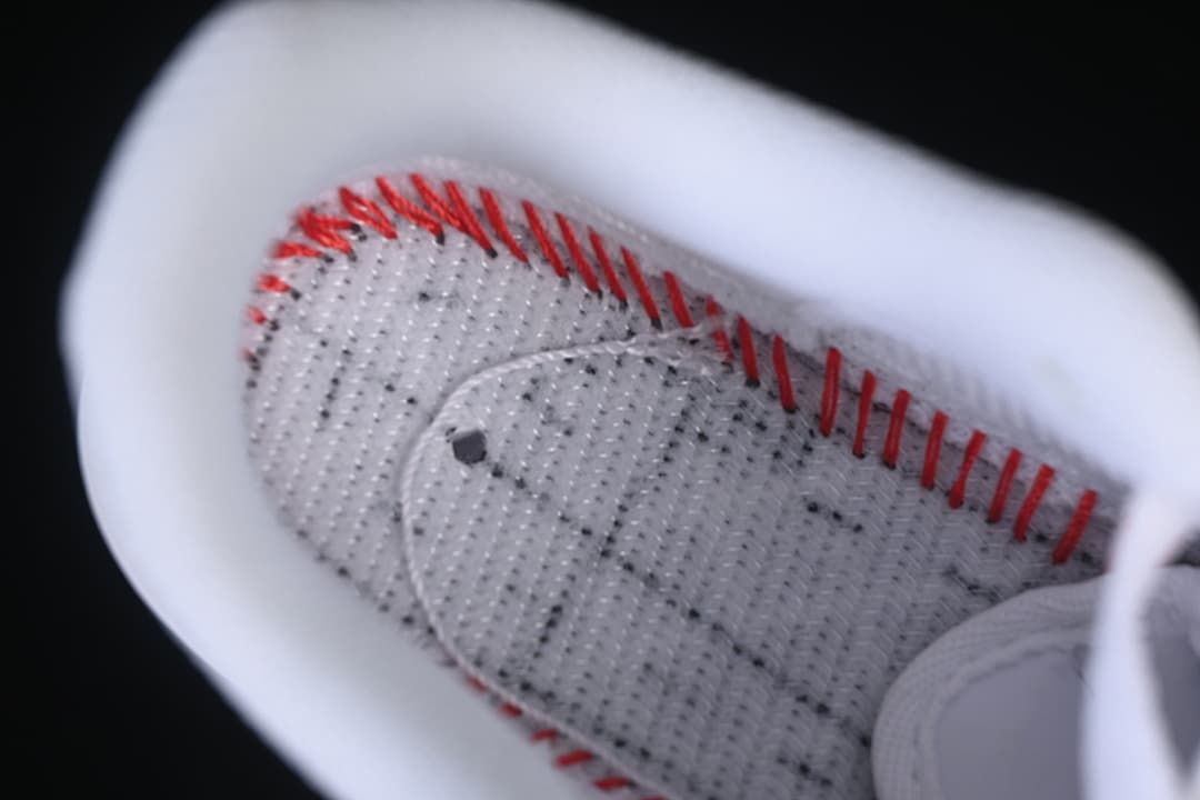 Close-up of the shoe interior and red stitching