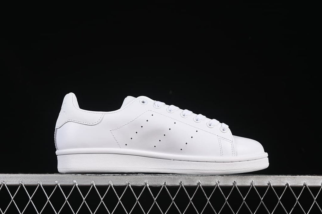 Side profile of the white low-top sneaker