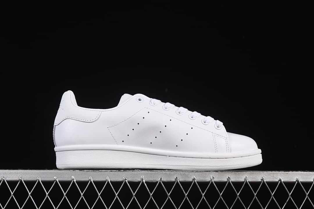 Side profile of the white low-top sneaker