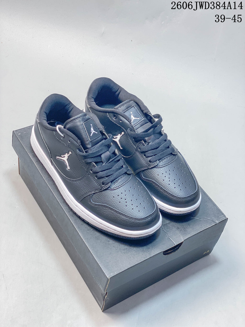 Pair of tonal grey Jordan Court Connect low-top sneakers