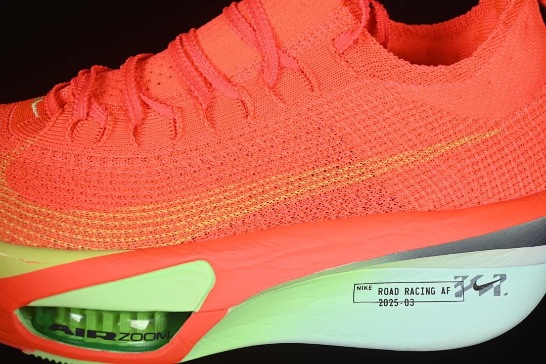 Close-up of the knit upper, side swoosh and sculpted midsole.