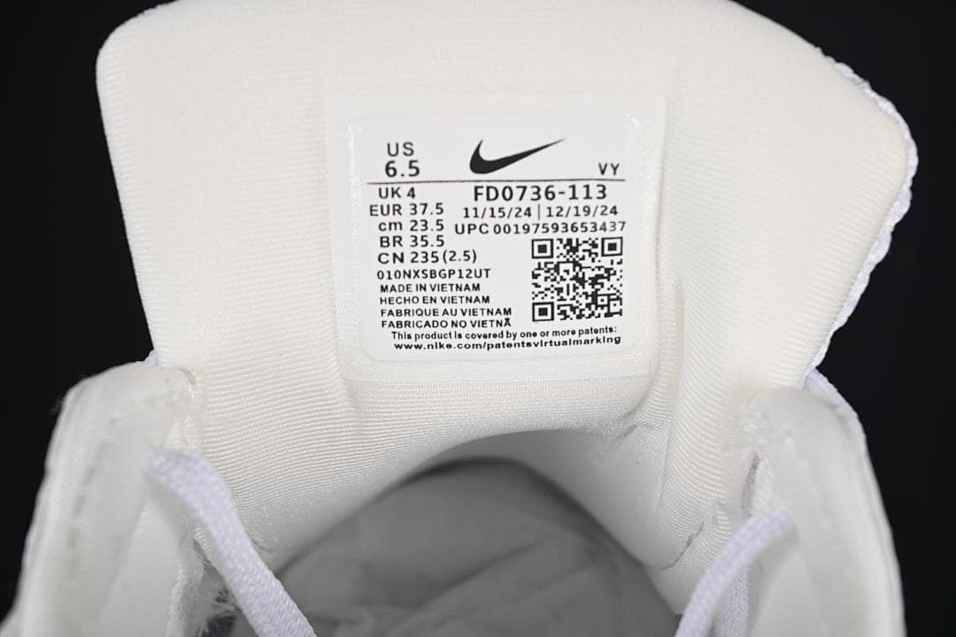Close-up of the sneaker tongue label showing size and style information