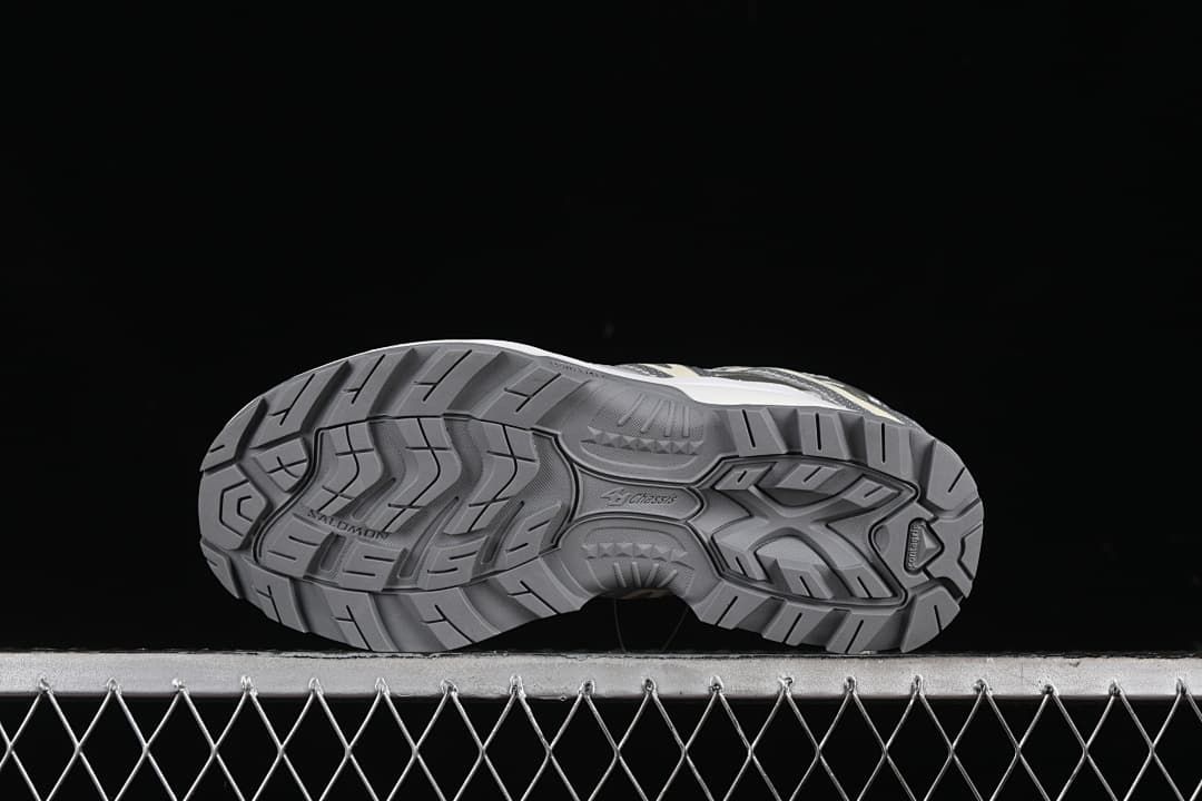 Underside view showing the patterned gray outsole.