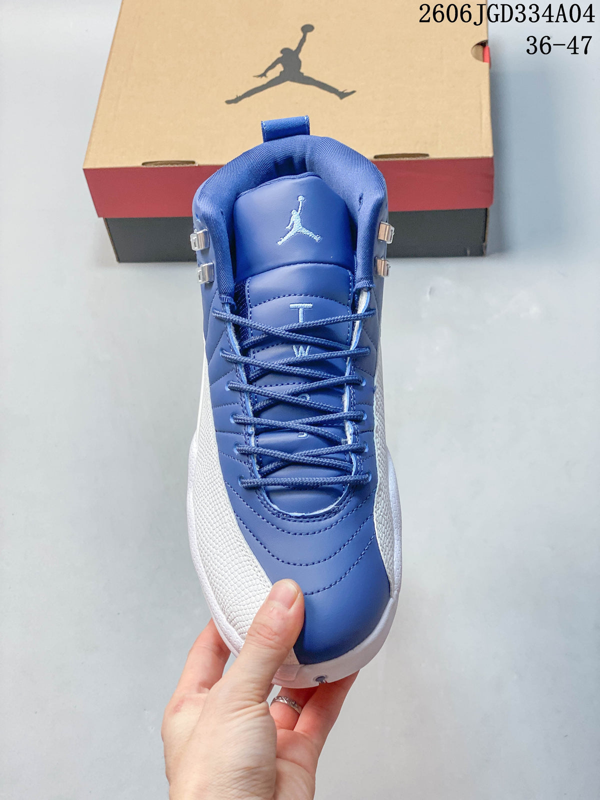 Front view of a blue and white Jordan Air Jordan 12 with laces and metallic eyelets